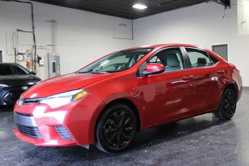 Red 2015 Toyota Corolla LE