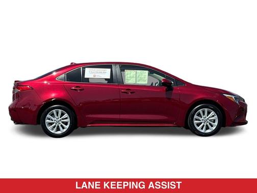 Ruby Flare Pearl 2026 Toyota Corolla Hybrid LE
