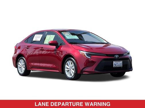 Ruby Flare Pearl 2026 Toyota Corolla Hybrid LE