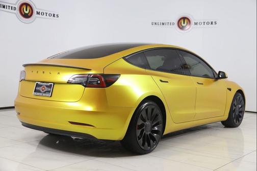Yellow 2023 Tesla Model 3 Performance