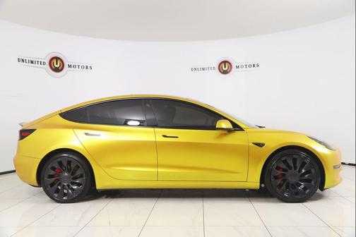 Yellow 2023 Tesla Model 3 Performance