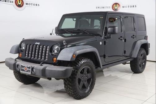 Black Forest Green Pearlcoat 2012 Jeep Wrangler Unlimited Rubicon