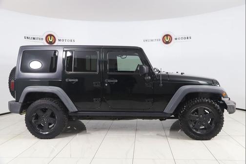 Black Forest Green Pearlcoat 2012 Jeep Wrangler Unlimited Rubicon