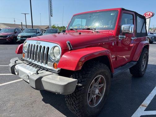 Red 2011 Jeep Wrangler Sahara