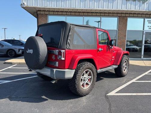 Red 2011 Jeep Wrangler Sahara