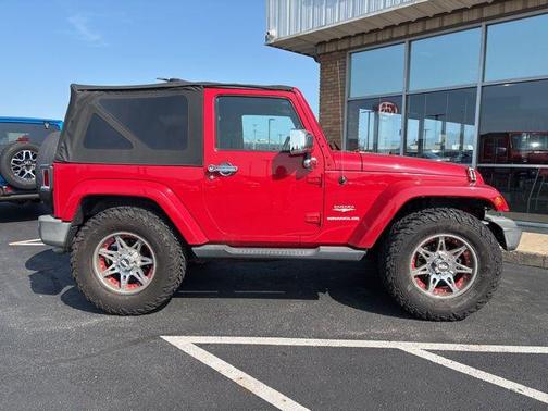 Red 2011 Jeep Wrangler Sahara