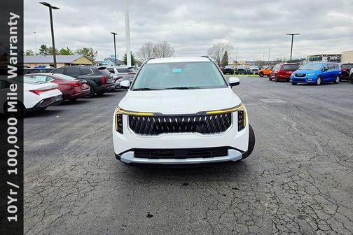 White Pearl 2026 Kia Carnival Hybrid EX