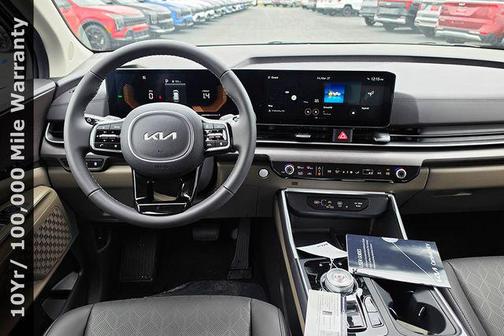 White Pearl 2026 Kia Carnival Hybrid EX