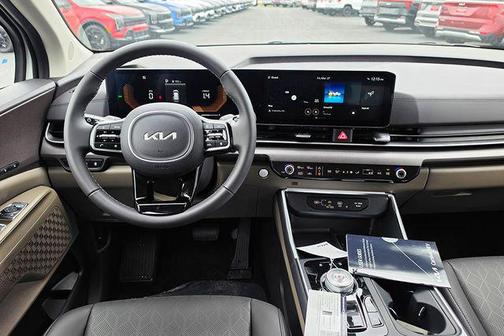 White Pearl 2026 Kia Carnival Hybrid EX