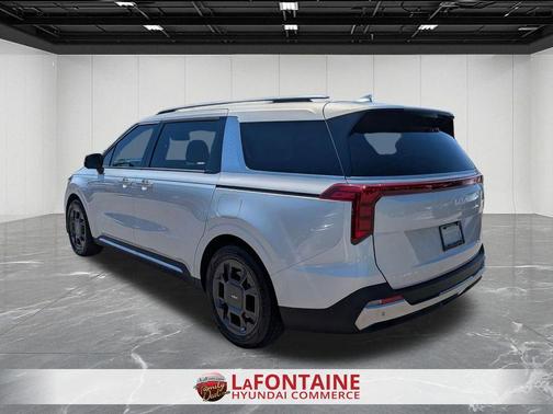 Ivory Silver 2025 Kia Carnival SX