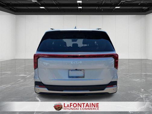 Ivory Silver 2025 Kia Carnival SX