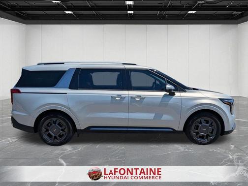 Ivory Silver 2025 Kia Carnival SX