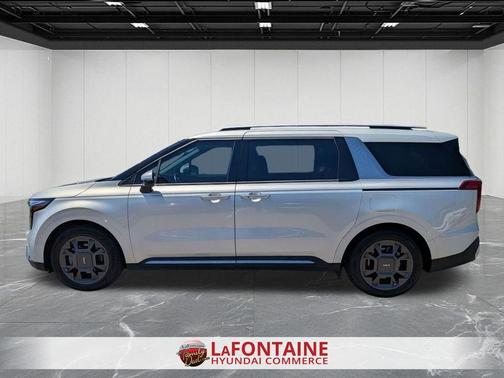 Ivory Silver 2025 Kia Carnival SX