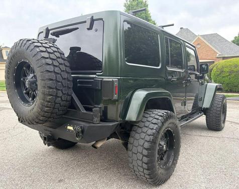 Natural Green Pearlcoat 2011 Jeep Wrangler Unlimited Sport