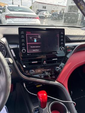 Midnight Black Metallic 2024 Toyota Camry Hybrid SE