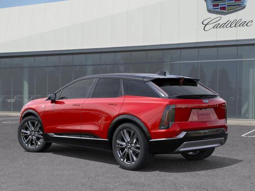 Radiant Red Tintcoat 2026 Cadillac OPTIQ Premium Sport
