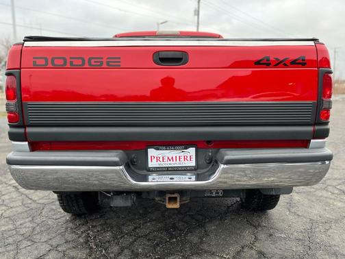 Flame Red / Light Driftwood SG 2000 Dodge Ram 2500 SLT