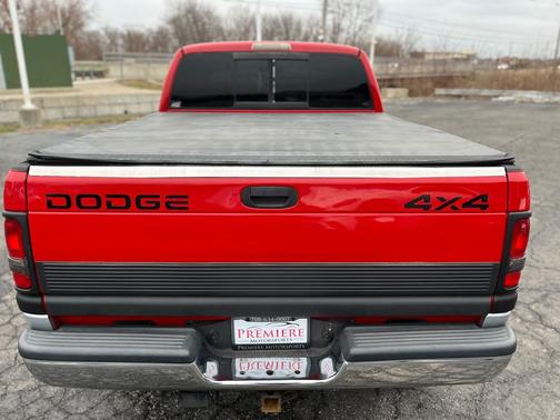 Flame Red / Light Driftwood SG 2000 Dodge Ram 2500 SLT