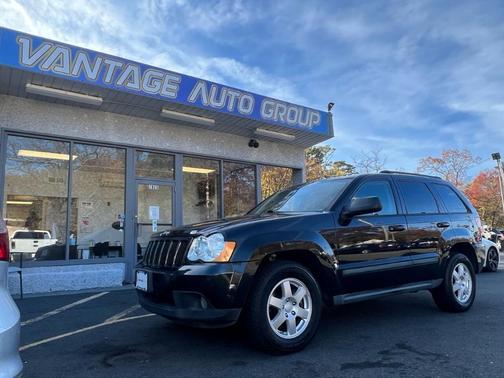 Photo 1 of 61 of 2009 Jeep Grand Cherokee Laredo