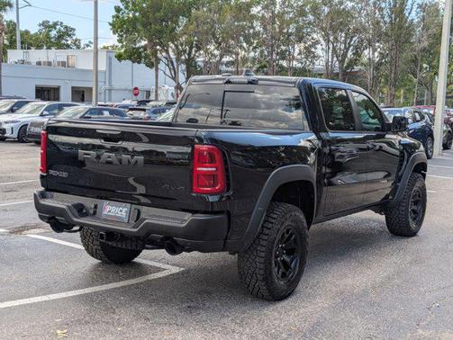 Diamond Black Crystal Pearlcoat 2026 RAM 1500 RHO Crew Cab 4x4 5'7' Box