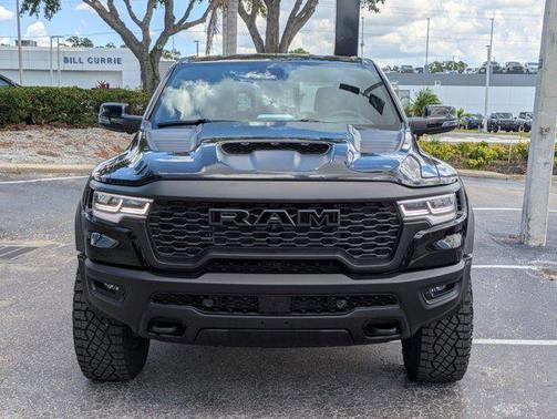 Diamond Black Crystal Pearlcoat 2026 RAM 1500 RHO Crew Cab 4x4 5'7' Box