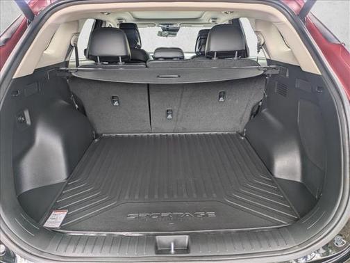 Dawning Red 2023 Kia Sportage SX