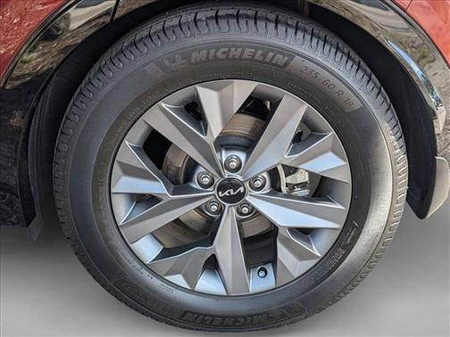 Dawning Red 2023 Kia Sportage SX