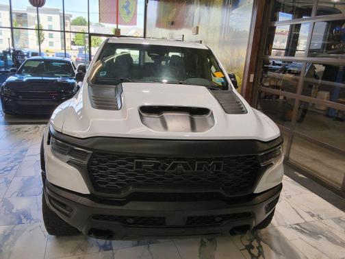 Bright White Clearcoat 2025 RAM 1500 RHO Crew Cab 4x4 5'7' Box