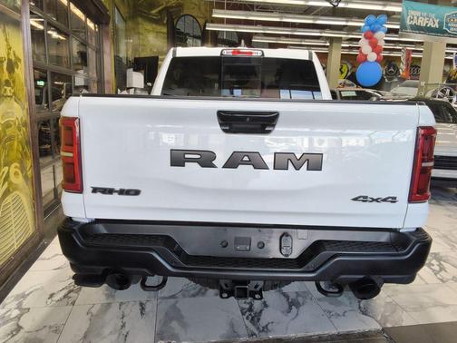 Bright White Clearcoat 2025 RAM 1500 RHO Crew Cab 4x4 5'7' Box