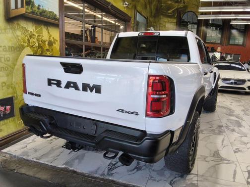 Bright White Clearcoat 2025 RAM 1500 RHO Crew Cab 4x4 5'7' Box
