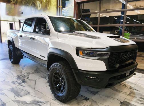 Bright White Clearcoat 2025 RAM 1500 RHO Crew Cab 4x4 5'7' Box