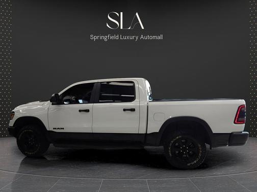 Ivory White Tri-Coat Pearlcoat 2023 RAM 1500 Rebel