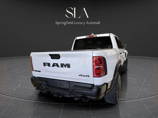 Diamond Black Crystal Pearlcoat 2026 RAM 1500 RHO Crew Cab 4x4 5'7' Box