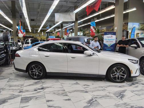 White Metallic 2026 BMW 530 xDrive