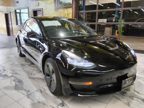 Solid Black 2023 Tesla Model 3 Standard Range
