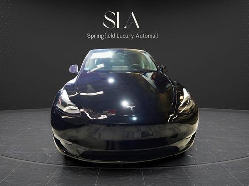 Solid Black 2025 Tesla Model Y Long Range Dual Motor All-Wheel Drive