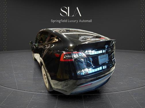 Solid Black 2025 Tesla Model Y Long Range Dual Motor All-Wheel Drive
