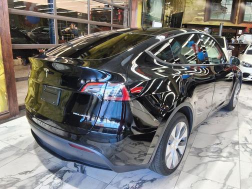 Solid Black 2023 Tesla Model Y Long Range Dual Motor All-Wheel Drive