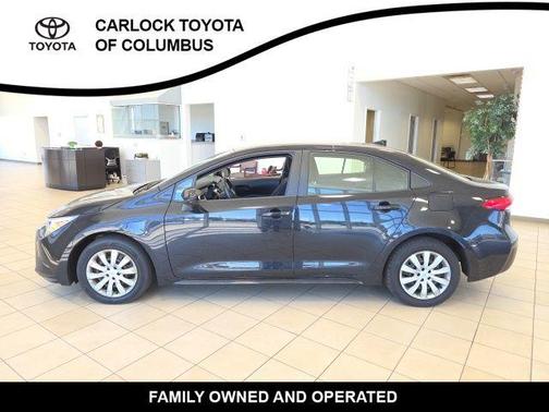 Midnight Black Metallic 2025 Toyota Corolla Hybrid LE