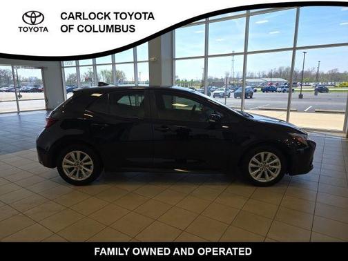 Midnight Black Metallic 2025 Toyota Corolla Hatchback SE