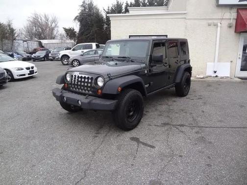 Natural Green Pearlcoat 2011 Jeep Wrangler Unlimited Rubicon