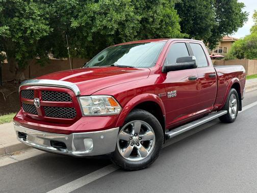 Red 2015 RAM 1500 Outdoorsman