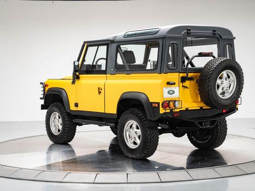 Yellow 1995 Land Rover Defender 90