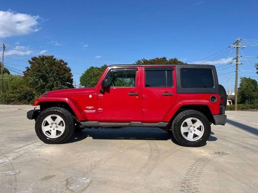 Flame Red Clearcoat 2011 Jeep Wrangler Unlimited Sahara