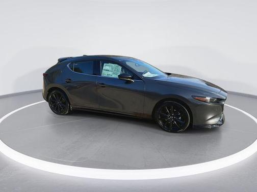 Machine Gray Metallic 2026 Mazda Mazda3 AWD w/Premium Package