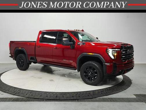 Volcanic Red Tintcoat 2025 GMC Sierra 2500 AT4