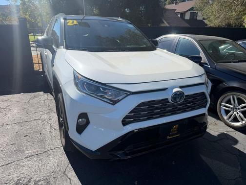 Blizzard Pearl/Midnight Black Metallic 2021 Toyota RAV4 Hybrid SE