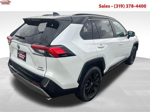 Wind Chill Pearl/Midnight Black Metallic 2024 Toyota RAV4 Hybrid SE