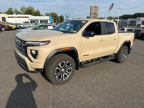 Desert Sand Metallic 2024 GMC Canyon AT4