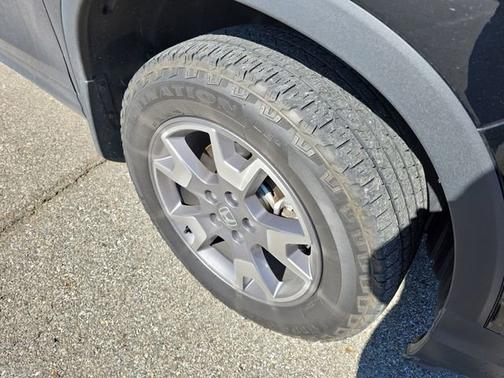 Black 2023 Honda Passport TrailSport